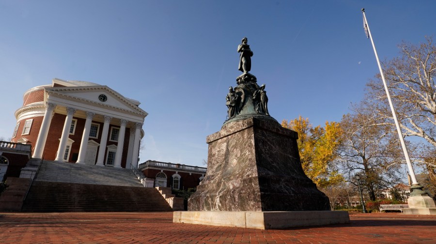 A statue of University of Virginia founder, Thomas Jefferson, stands watch over the Rotunda