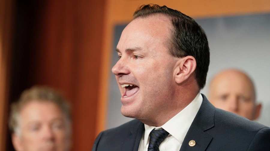 Sen. Mike Lee, R-Utah, center, Senator Rick Scott, R-Fla., right, and Senator Rand Paul, R-Ky., left, speak during a news conference on spending, Wednesday, Dec. 14, 2022, on Capitol Hill in Washington.