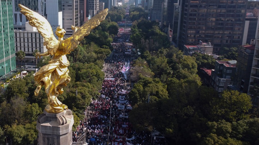 Supporters of Mexican President Andrés Manuel López Obrador march in Mexico City