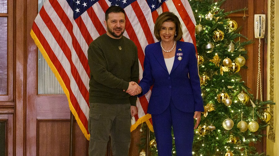 Speaker Nancy Pelosi (D-Calif.) shakes hands with Ukrainian President Volodymyr Zelensky