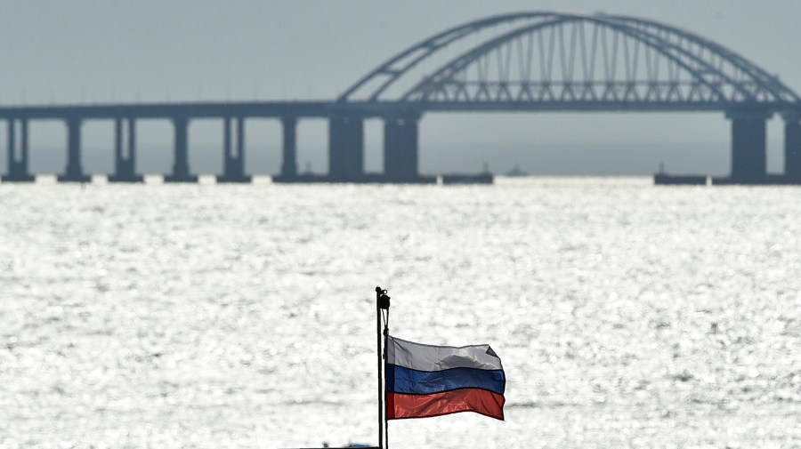 Flag is seen in front of bridge linking Russia-annexed Crimea with Russia