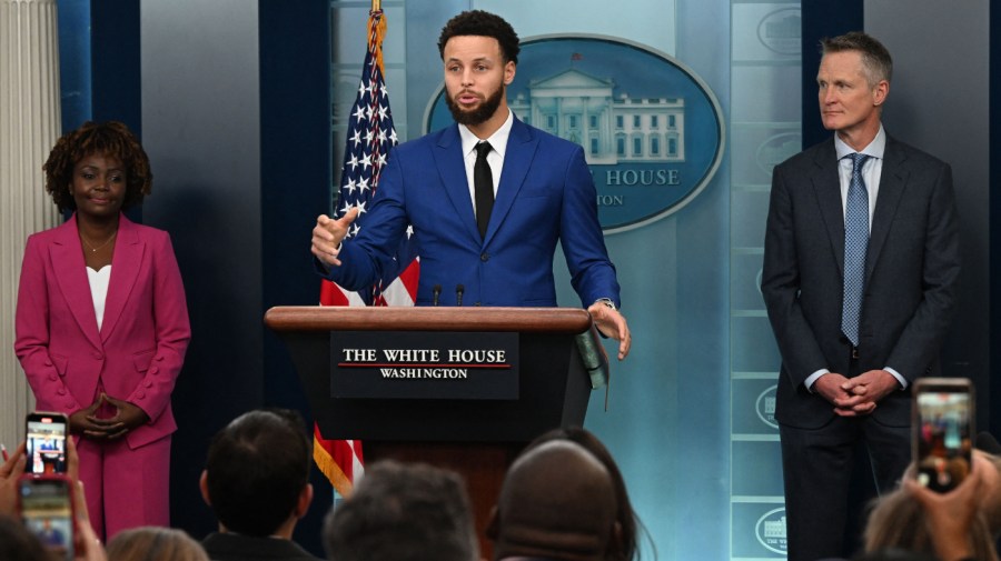 Golden State Warrior Stephen Curry, with head coach Steve Kerr and White House press secretary Karine Jean-Pierre