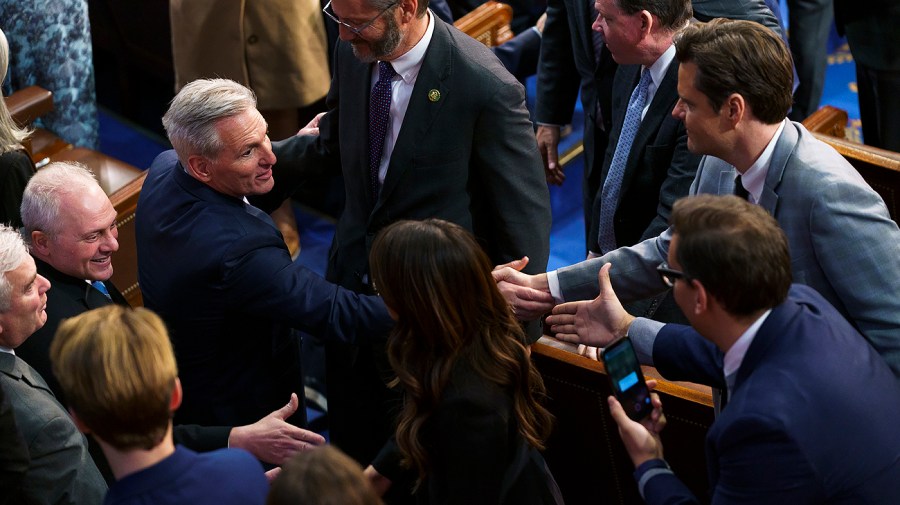 Speaker-elect Kevin McCarthy (R-Calif.) shakes hands with Rep. Matt Gaetz (R-Fla.)