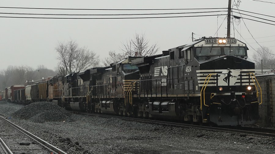 A Norfolk Southern train passes through the center of the village of East Palestine, Ohio