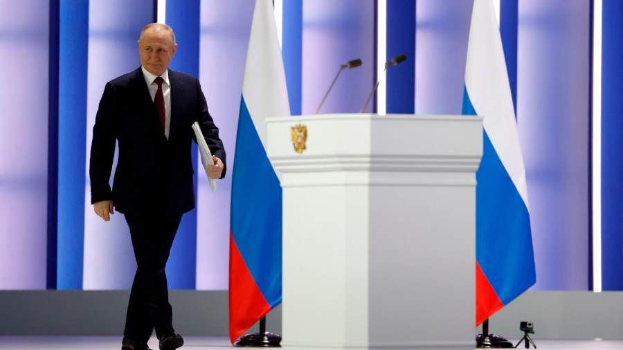 Russian President Vladimir Putin arrives to give his annual state of the nation address in Moscow, Russia, Tuesday, Feb. 21, 2023.