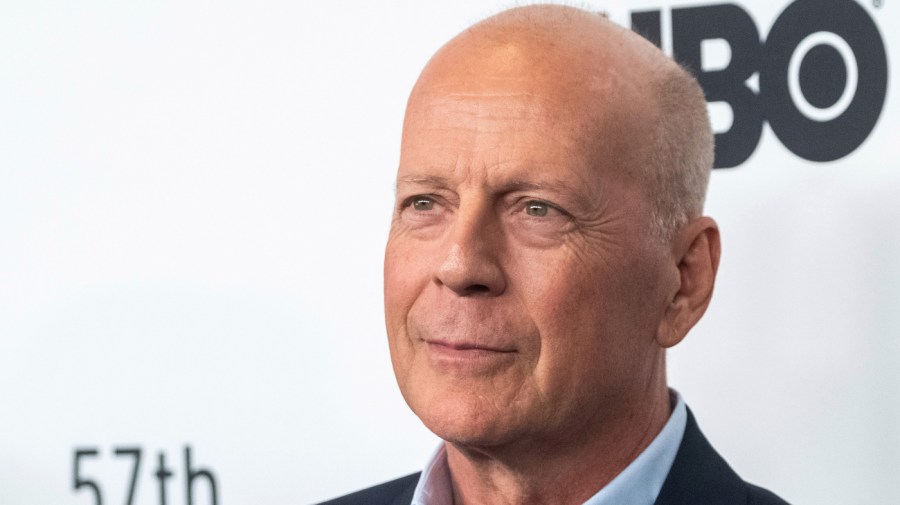 Bruce Willis attends a movie premiere