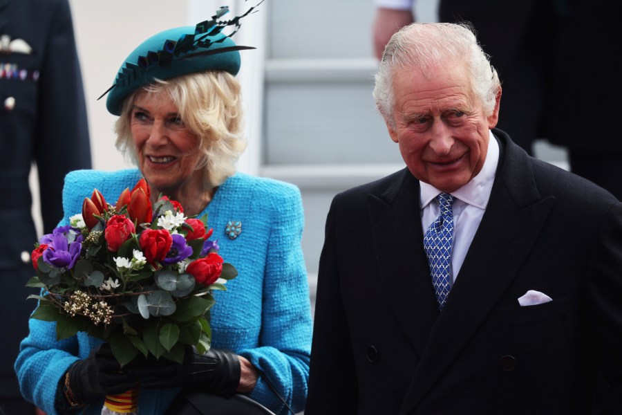 Britain's King Charles III and Camilla, the Queen Consort, arrive at the airport in Berlin