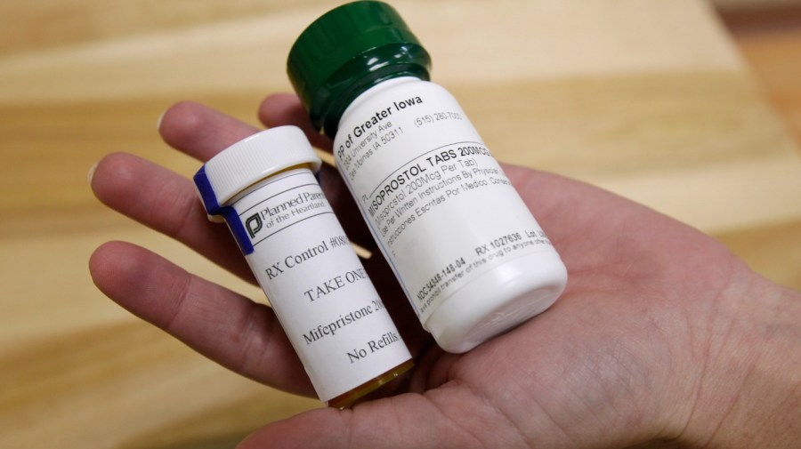 Bottles of abortion pills mifepristone, left, and misoprostol, right, at a clinic in Des Moines, Iowa