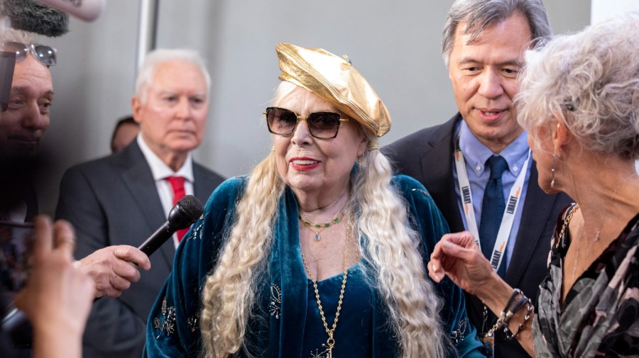 Joni Mitchell arrives at the presentation of the Gershwin Prize, which honors a musician's lifetime contribution to popular music, hosted at DAR Constitution Hall in Washington on Wednesday, March 1, 2023. She is this year's winner.