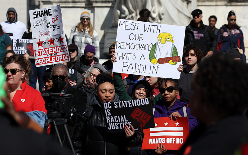 Demonstrators participate in a rally for Washington, D.C., independence near the Capitol