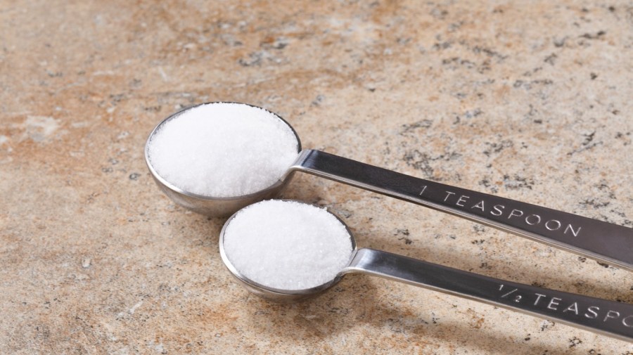 tablespoon and teaspoon both filled with salt