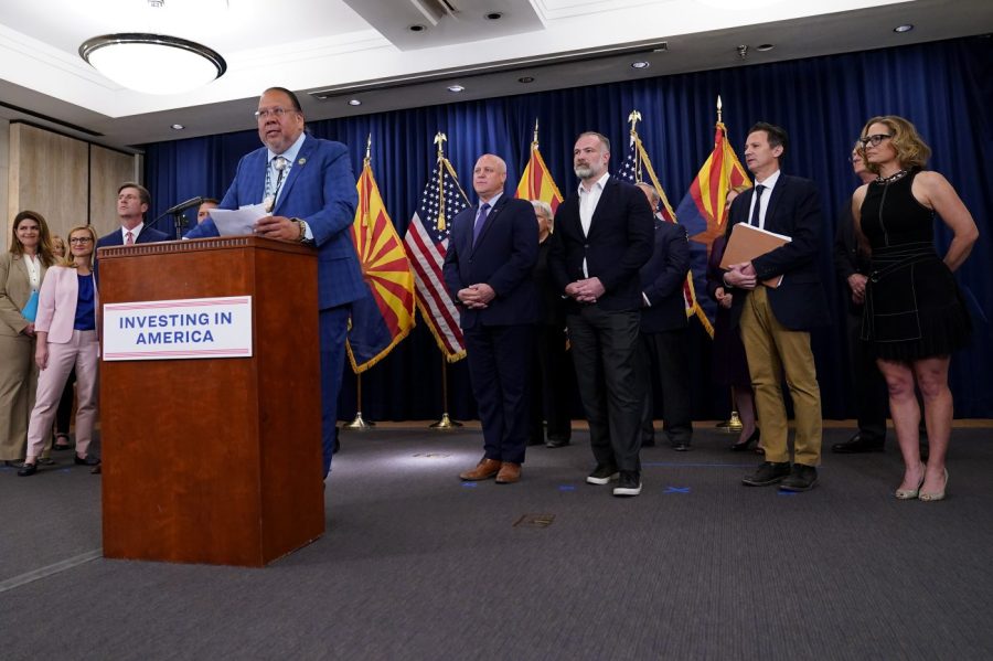 Gila River Indian Community Governor Stephen Roe Lewis, backdropped by federal, state and local officials, speaks at the Capitol, Thursday, April 6, 2023, in Phoenix. Lewis was discussing newly announced water conservation funding for Gila River Indian Community and water users across the Colorado River Basin aimed to protect the stability and sustainability of the Colorado River System. (AP Photo/Matt York)