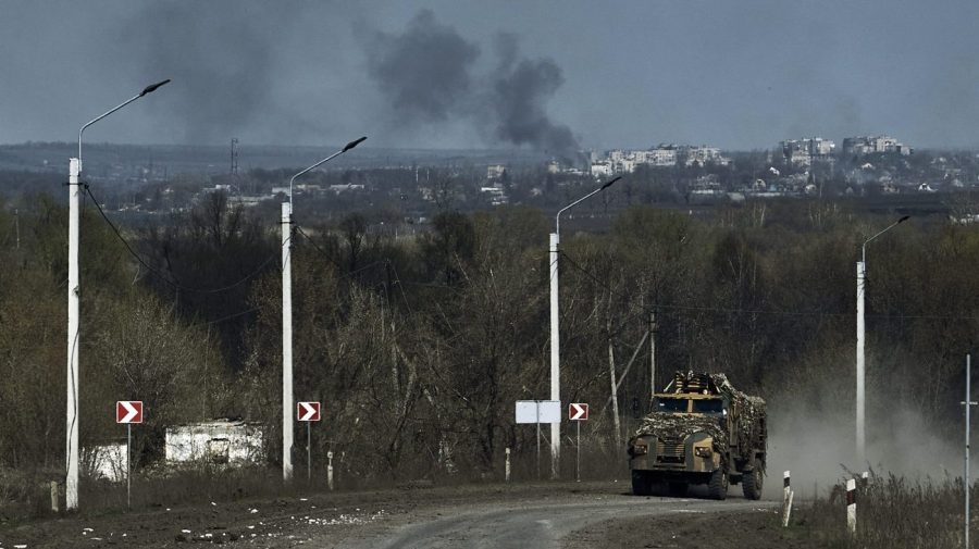 A Ukrainian APC seen on the road on the frontline in Bakhmut, Donetsk region, Ukraine, Sunday, April 9, 2023. (AP Photo/Libkos)