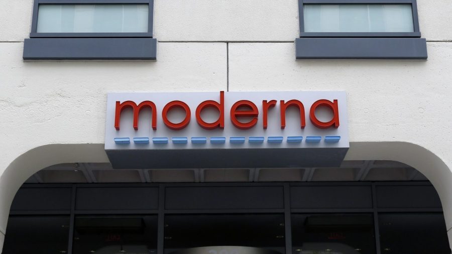 A sign marks an entrance to a Moderna building in Cambridge, Mass., on Monday, May 18, 2020. Moderna shares slipped Tuesday, April 11, 2023, after the COVID-19 vaccine developer said its potential flu vaccine needs more study in a late-stage clinical trial. (AP Photo/Bill Sikes)