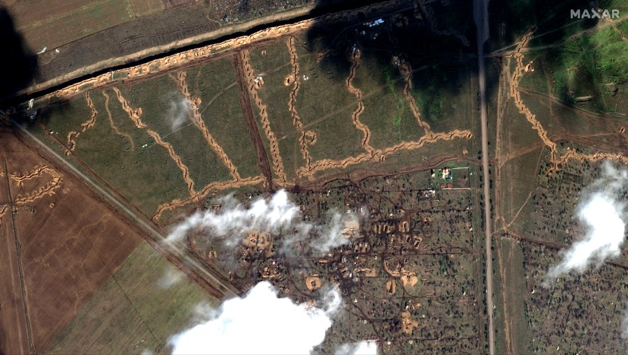 This satellite image provided by Maxar Technologies shows trenches and deployed vehicles in the north of Armiansk, Crimea, Feb. 16, 2023. (Satellite image ©2023 Maxar Technologies via AP)