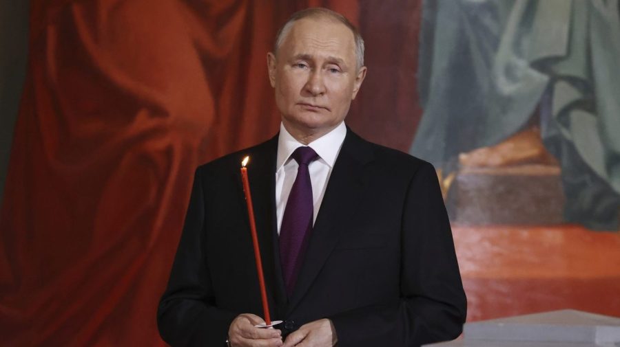 Russian President Vladimir Putin attends an Orthodox Easter service in the Christ the Savior Cathedral in Moscow, Russia, Saturday, April 15, 2023. (Sergei Karpukhin, Sputnik, Kremlin Pool Photo via AP)