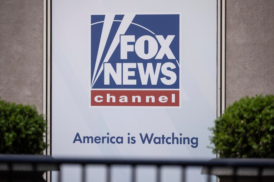 FILE - A logo of Fox News is displayed outside Fox News Headquarters in New York, Wednesday, April. 12, 2023. Dominion Voting Systems' defamation lawsuit against Fox News for airing bogus allegations of fraud in the 2020 election is set to begin trial on Tuesday, April 18, 2023, in Delaware. (AP Photo/Yuki Iwamura, File)