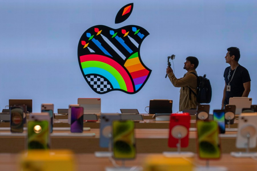 iPhones are on display during a press preview of India's first Apple Store in Mumbai, India, Monday, April 17, 2023. Apple will open its first retail store in India in Mumbai on Tuesday. (AP Photo/Rafiq Maqbool)