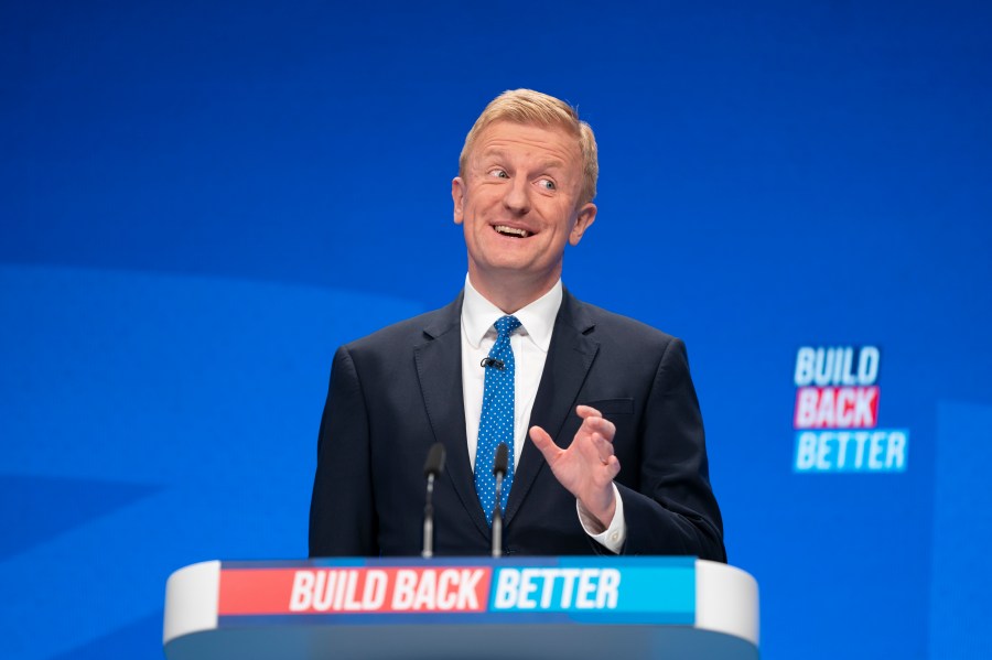 FILE - Oliver Dowden speaks at the Conservative Party Conference in Manchester, England, on Oct. 3, 2021. U.K. officials say Russian hackers are seeking to “disrupt or destroy” Britain’s critical infrastructure and not enough is being done to stop them. Britain’s National Cybersecurity Center has issued an official threat notice to operators of Britain’s electricity, water and other critical systems, telling them to boost their defenses. Cabinet Minister Oliver Dowden said the threat comes from hackers sympathetic to Russia though not necessarily directed by the Russian state. (AP Photo/Jon Super, File)