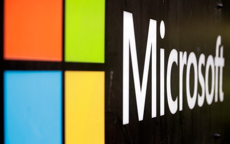 FILE - The Microsoft company logo is displayed at their offices in Sydney, Australia, on Wednesday, Feb. 3, 2021. Local leaders have approved plans for a massive Microsoft data center in a southeast Wisconsin village, Tuesday, April 18, 2023, where the world's largest electronics manufacturer has a huge campus. (AP Photo/Rick Rycroft, File)