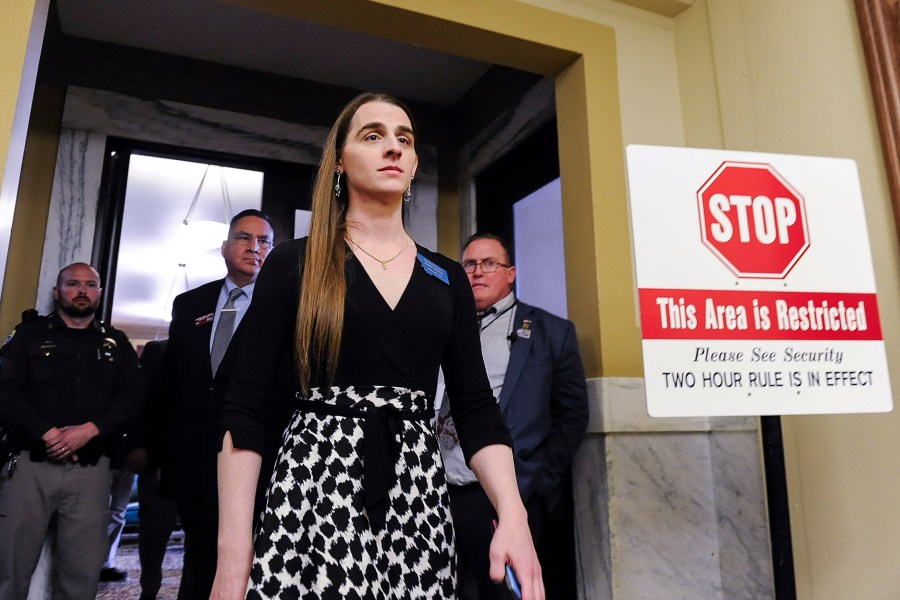 Rep. Zooey Zephyr, D-Missoula, walks out of the Montana House of Representatives after lawmakers voted to ban her from the chamber on Wednesday, April 26, 2023, in the State Capitol in Helena, Montana. Zephyr was barred from participating on the House floor as Republican leaders voted Wednesday to silence her for the rest of 2023 session after she protested GOP leaders’ decision earlier in the week to silence her. (Thom Bridge/Independent Record via AP)