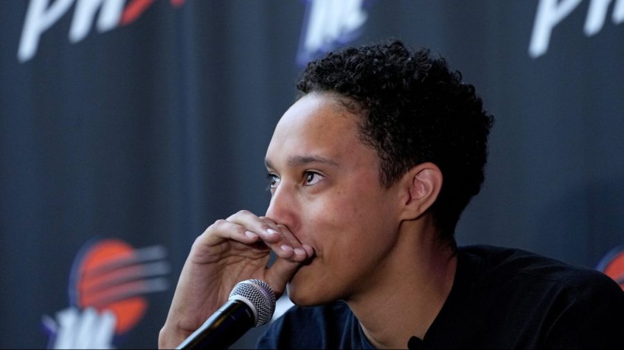 WNBA basketball player Brittney Griner fights back tears at a news conference, Thursday, April 27, 2023, in Phoenix. (AP Photo/Matt York)