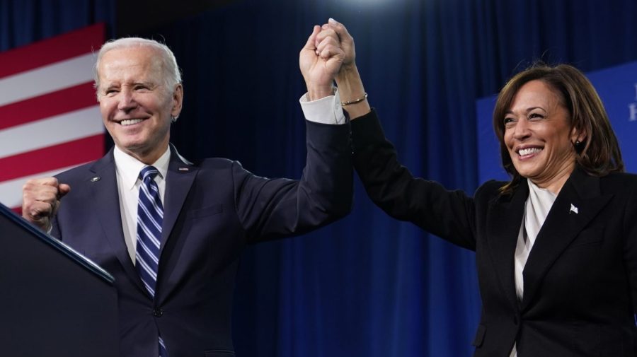 FILE - President Joe Biden and Vice President Kamala Harris stand on stage at the Democratic National Committee winter meeting, Feb. 3, 2023, in Philadelphia. Harris is poised to play a critical role in next year's election as President Joe Biden seeks a second term. (AP Photo/Patrick Semansky, File)