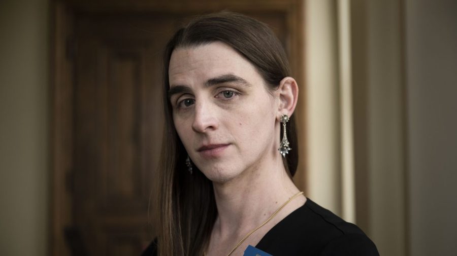 FILE - Rep. Zooey Zephyr poses for a photo at the Montana State Capitol in Helena, Mont., on April 26, 2023. The banishment of transgender lawmaker Zephyr from Montana's House floor has showcased the rising power of hardline conservatives who are leveraging divisive social issues to gain political influence. (AP Photo/Tommy Martino, File)