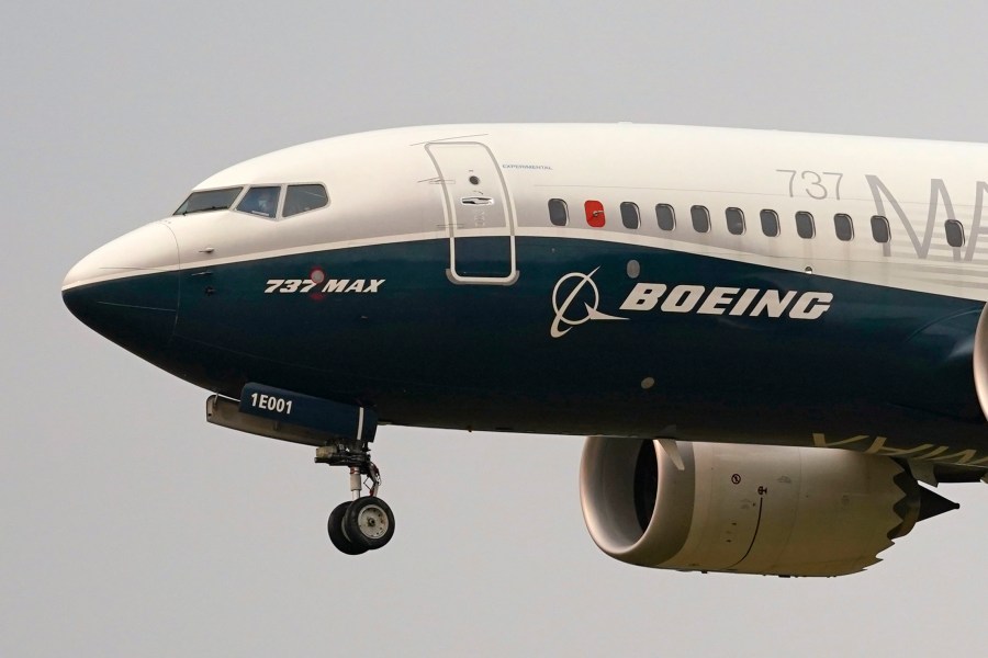 FILE - A Boeing 737 Max jet prepares to land at Boeing Field following a test flight in Seattle, Sept. 30, 2020. Some engineers for the Federal Aviation Administration wanted to ground the Boeing 737 Max soon after a second deadly crash, but top officials in the agency overruled them, according to a government watchdog. The inspector general of the Transportation Department said in a new report Friday, April 28, 2023, that FAA officials wanted to sort out raw data about the two crashes, and held off grounding the plane despite growing international pressure. (AP Photo/Elaine Thompson, File)