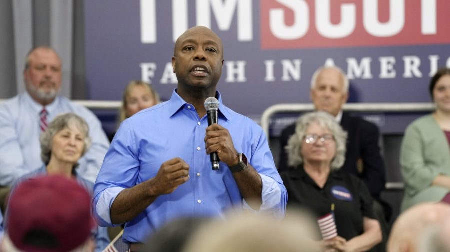 U.S. Sen. Tim Scott, R-S.C., speaks at a town hall, Sunday, April 30, 2023, in Charleston, S.C. Scott has launched an exploratory committee and says he'll announce a decision on the 2024 presidential race by the end of May. (AP Photo/Meg Kinnard)