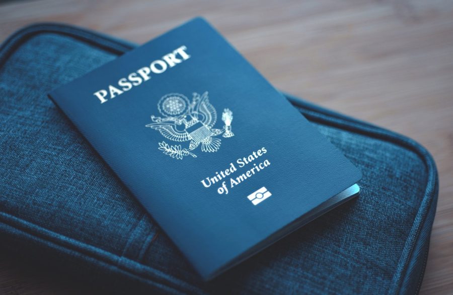 A U.S. passport is seen on a surface.