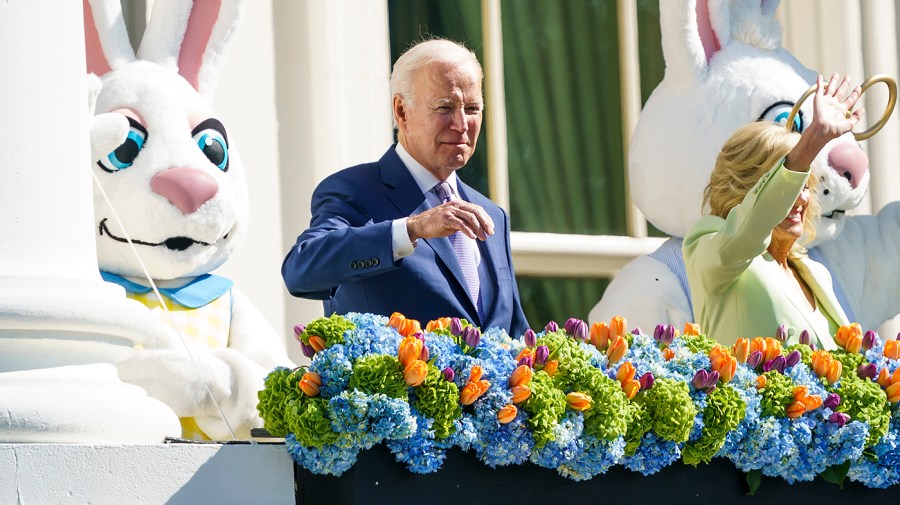 President Biden, first lady Jill Biden and the Easter Bunnies wave during the annual White House Easter Egg Roll