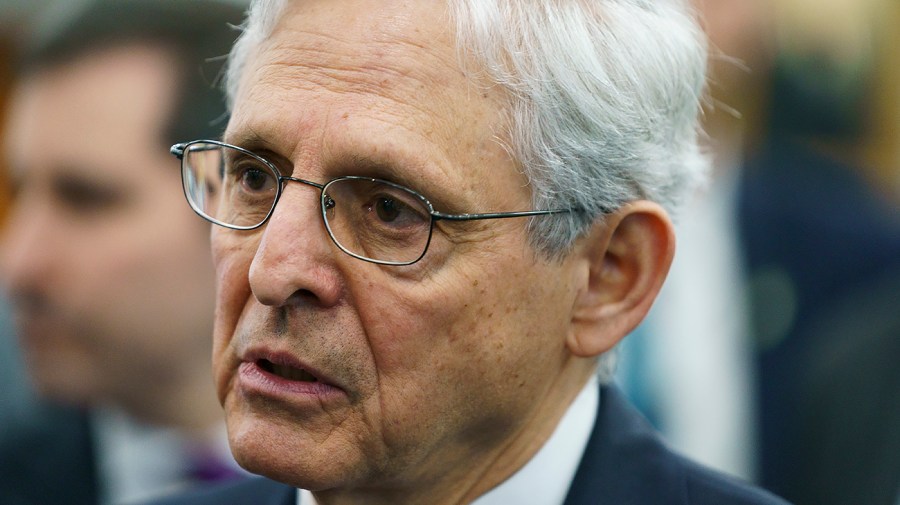 Attorney General Merrick Garland speaks with Rep. Harold Rogers (R-Ky.)