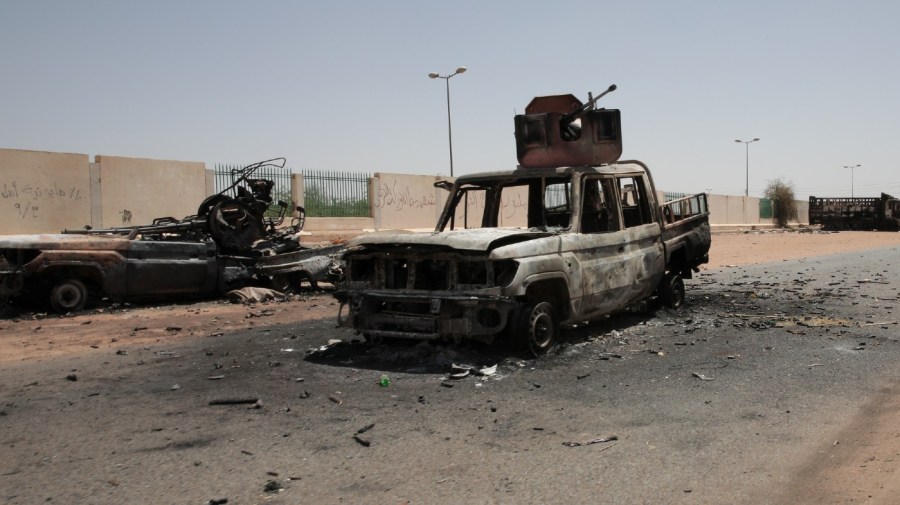 File - Destroyed military vehicles are seen in southern in Khartoum, Sudan, Thursday, April 20, 2023. The latest attempt at a cease-fire between the rival Sudanese forces faltered as gunfire rattled the capital of Khartoum.