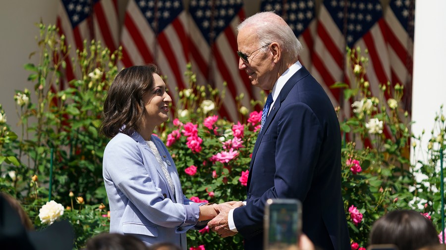 Union High School math teacher Rebecka Peterson of Tulsa, Okla., greets President Biden