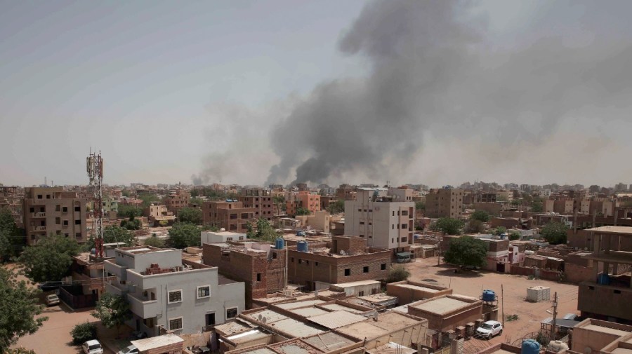 Smoke is seen rising from Khartoum's skyline, Sudan, Sunday, April 16, 2023.