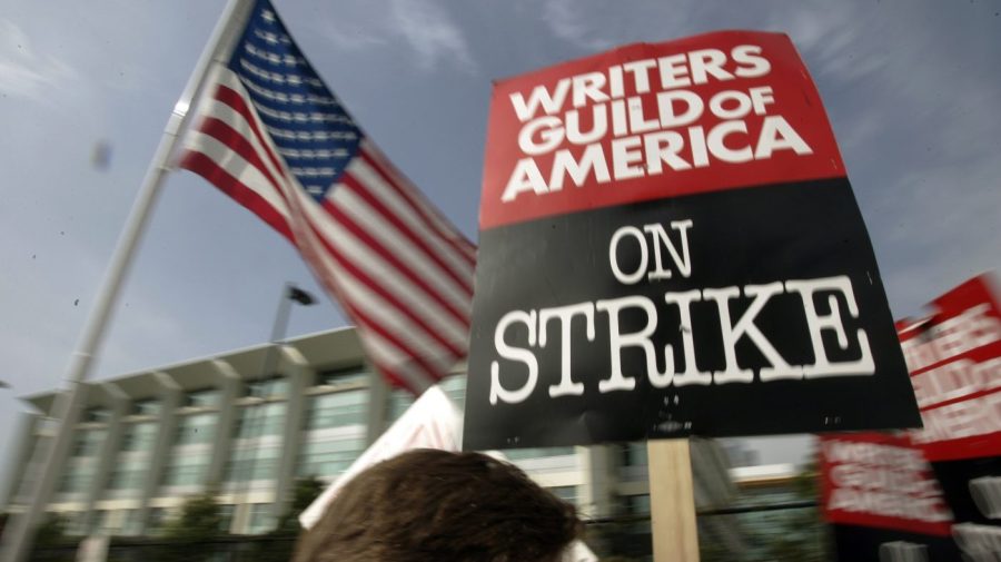 FILE - Writers Guild of America (WGA) writers and others strike against the Alliance of Motion Picture and Television Producers (AMPTP) in a rally at Fox Plaza in Los Angeles' Century City district on Nov. 9, 2007. Television and movie writers on Monday, May 1, 2023, declared that they will launch an industrywide strike for the first time since 2007, as Hollywood girded for a shutdown in a dispute over fair pay in the streaming era. (AP Photo/Reed Saxon, File)