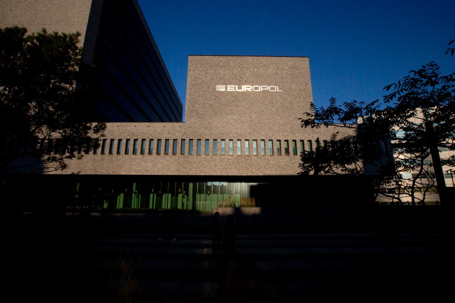 FILE- This Wednesday, Oct. 10, 2018, file photo shows the sun bouncing off the Europol headquarters in The Hague, Netherlands. LEuropean Union law enforcement agency Europol says police around the world have seized an online marketplace and arrested nearly 300 people allegedly involved in buying and selling drugs on the dark web. The operation, coordinated by Europol and targeting the “Monopoly Market,” is the latest major takedown of sales platforms for drugs and other illicit goods on the dark web. Europol said Tuesday, May 2, 2023. (AP Photo/Peter Dejong, File)