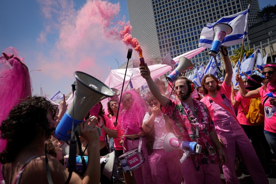 Israelis protest against plans by Prime Minister Benjamin Netanyahu's government to overhaul the judicial system, in Tel Aviv, Israel, Thursday, May 4, 2023. (AP Photo/Ohad Zwigenberg)