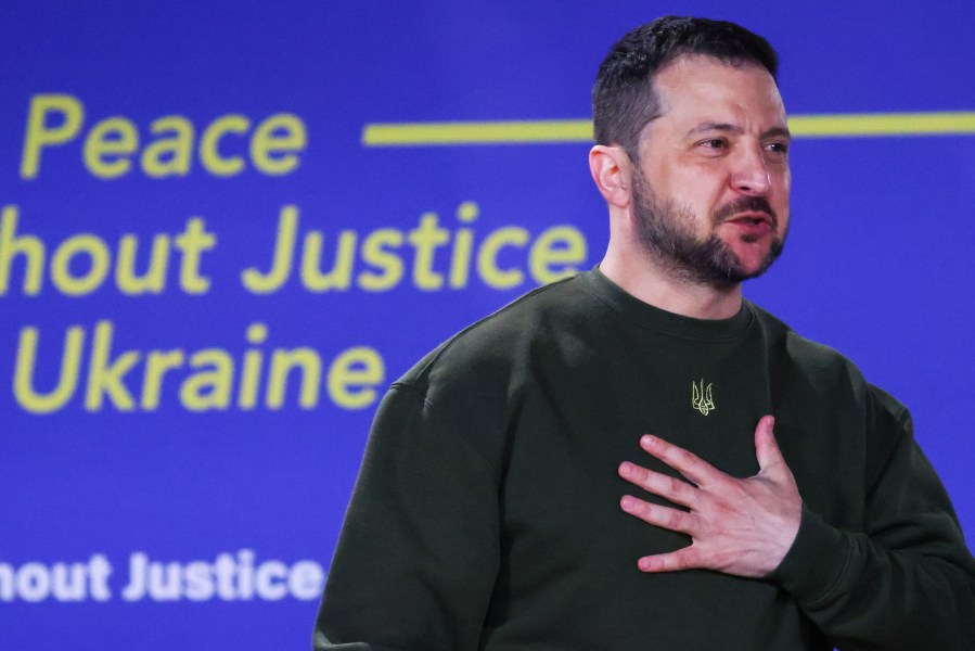 Ukraine's President Volodymyr Zelenskyy delivers a speech titled "No Peace Without Justice for Ukraine", in the Hague, Netherlands, Thursday, May 4, 2023. (Yves Herman/Pool via AP)