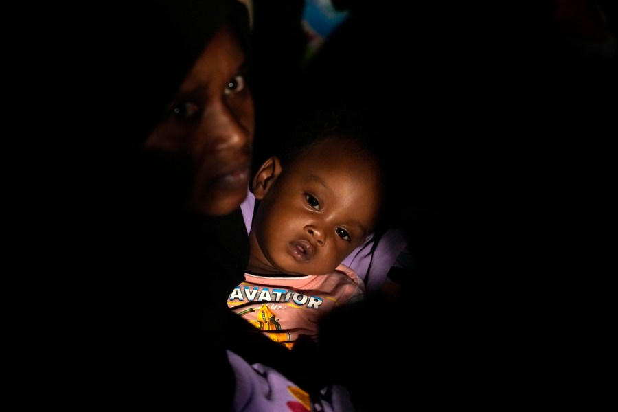 FILE - Sudanese evacuees wait before boarding a Saudi military ship to Jeddah port, at Port Sudan, Sudan, late Tuesday, May 2, 2023. Sudan’s warring sides were beginning talks Saturday that aim to firm up a shaky cease-fire after three weeks of fierce fighting that has killed hundreds and pushed the African country to the brink of collapse, the U.S. and Saudi Arabia said. (AP Photo/Amr Nabil, File)