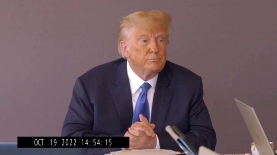 In this image taken from video released by Kaplan Hecker & Fink, former President Donald pauses during his Oct. 19, 2022, deposition for his trial against writer E. Jean Carroll. The video recording of Trump being questioned about the rape allegations against him was made public for the first time Friday, May 5, 2023, providing a glimpse of the Republican's emphatic, often colorful denials. (Kaplan Hecker & Fink via AP)