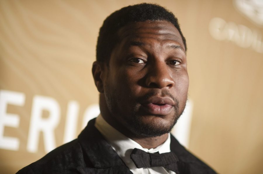 FILE - Jonathan Majors arrives at the American Black Film Festival Honors on March 5, 2023, at 1 Hotel in West Hollywood, Calif. Majors was confronted Tuesday, May 9, with a revised domestic violence charge stemming from a woman’s allegations that the Marvel star twisted her arm, struck her head and shoved her into a vehicle in New York City in March. (Photo by Richard Shotwell/Invision/AP, File)