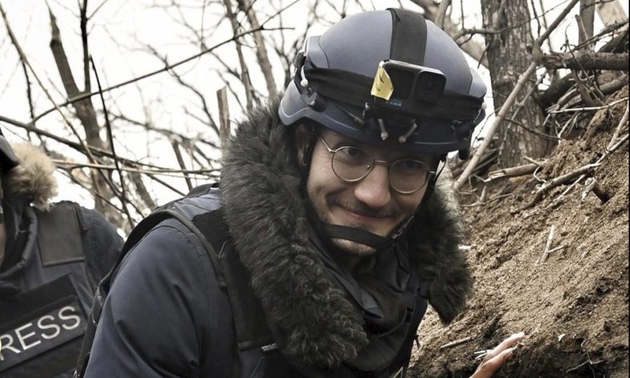 AFP journalist Arman Soldin walks in a trench as he is covers the war in Ukraine, March 18, 2023. French international news agency Agence France-Presse says its Ukraine video coordinator Arman Soldin was killed Tuesday May 9, 2023, during a rocket attack near the eastern Ukrainian city of Bakhmut. In a tweet, AFP said other agency journalists were with Arman Soldin at the time of the Grad rocket bombardment. French media outlets reported that the late afternoon attack took place in the vicinity of Chasiv Yar, a town near Bakhmut. Russian forces have been trying to capture the city for nine months, making Bakhmut the focus of the war's longest battle. (Aris Messinis/AFP via AP)