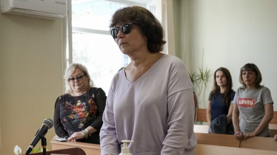 Irina Tsybaneva, 60, stands in a courtroom in St. Petersburg, Russia, Thursday, May 11, 2023. Tsybaneva was charged with desecrating a grave after she left insulting words on the grave of Russian President Vladimir Putin's parents last October. (AP Photo/Dmitri Lovetsky)