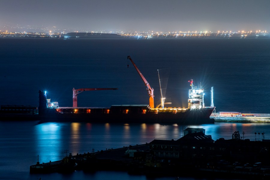 The Russian vessel, Lady R, is docked at the Simon's Town Naval Base near Cape Town, South Africa, Thursday, Dec. 8, 2022. The U.S. ambassador to South Africa has accused the country of providing weapons to Russia. Ambassador Reuben Brigety said the U.S. government was certain that weapons were loaded onto a cargo ship that docked secretly at a naval base near the city of Cape Town for three days in December. (AP Photo)