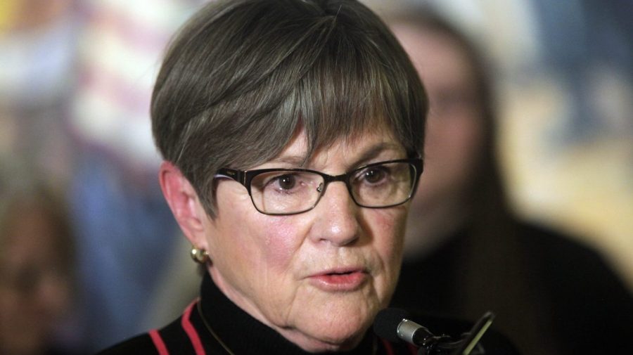 Kansas Gov. Laura Kelly speaks during a news conference with former Kansas Teacher of the Year winners, Tuesday, April 25, 2023, at the Statehouse in Topeka, Kan. As conservative Republican lawmakers promote school choice proposals, the Democratic governor says the state should not "divert" its tax dollars to private schools. (AP Photo/John Hanna)