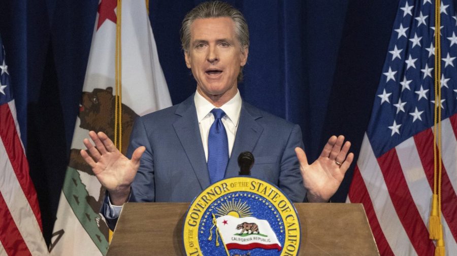 California Gov. Gavin Newsom announces the May budget revision on Friday, May 12, 2023 in Sacramento, Calif. Newsom said Friday the state's budget deficit has grown to nearly $32 billion. That's about $10 billion more than predicted in January, when the governor offered his first budget proposal. (Hector Amezcua/The Sacramento Bee via AP)