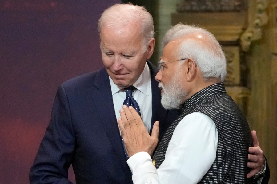 FILE - U.S. President Joe Biden, left, and India Prime Minister Narendra Modi talks during the G20 leaders summit in Nusa Dua, Bali, Indonesia, Nov. 15, 2022. Biden has made it a mission for the U.S. to build friendships overseas, and the next few weeks will offer a vivid demonstration of the importance he’s placing on a relationship with Modi. (AP Photo/Dita Alangkara, Pool, File)