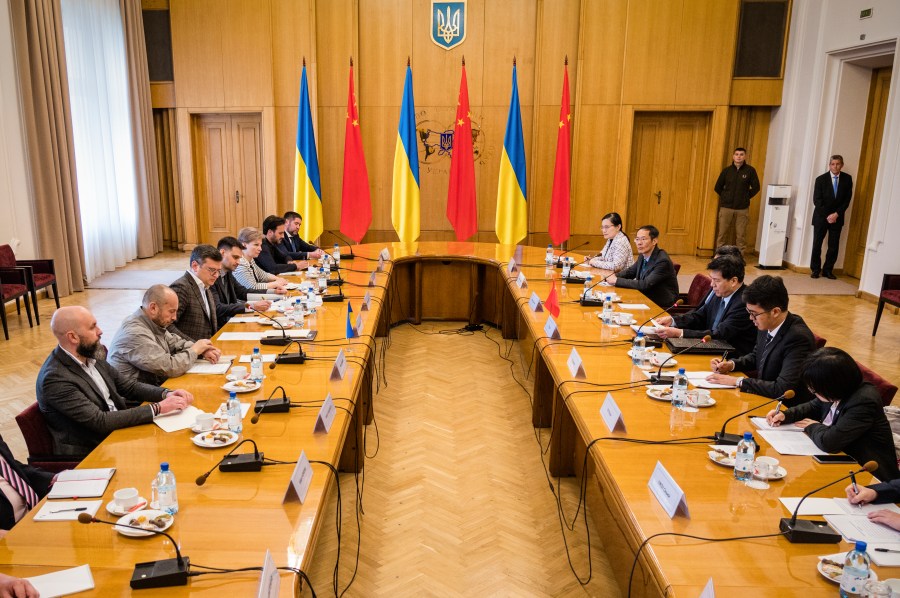 In this photo provided by the Ukrainian Foreign Ministry Press Office, Ukrainian Foreign Minister Dmytro Kuleba, center left, and Li Hui, Chinese envoy, center right, during their talks in Kyiv, Ukraine, Wednesday, May 17, 2023. (Ukrainian Foreign Ministry Press Office via AP)